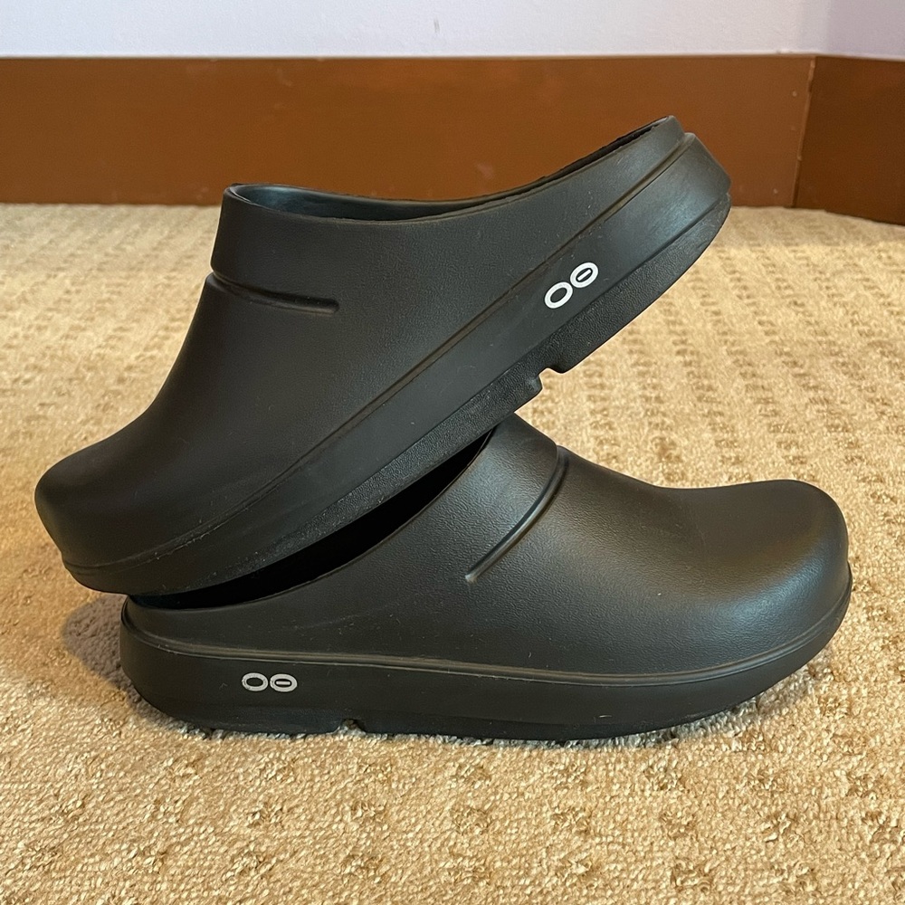 Oofos. Black rubber clogs. Modern crocs but way more comfortable.